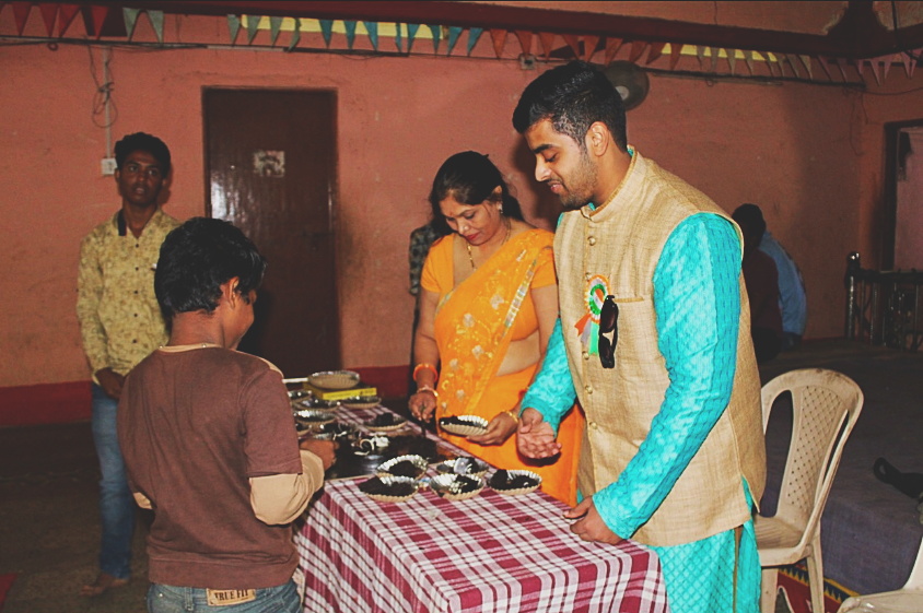 Giving out Birthday Cake to the Orphans