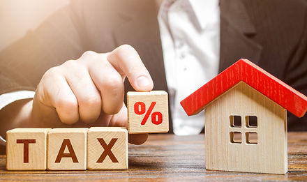 1920-man-holds-a-percentage-of-real-estate-tax-taxation-on-purchase-or-sale-of-a-home-main