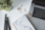 1920-desk-with-laptop-notebook-pen-plant-and-paper-clip.jpg