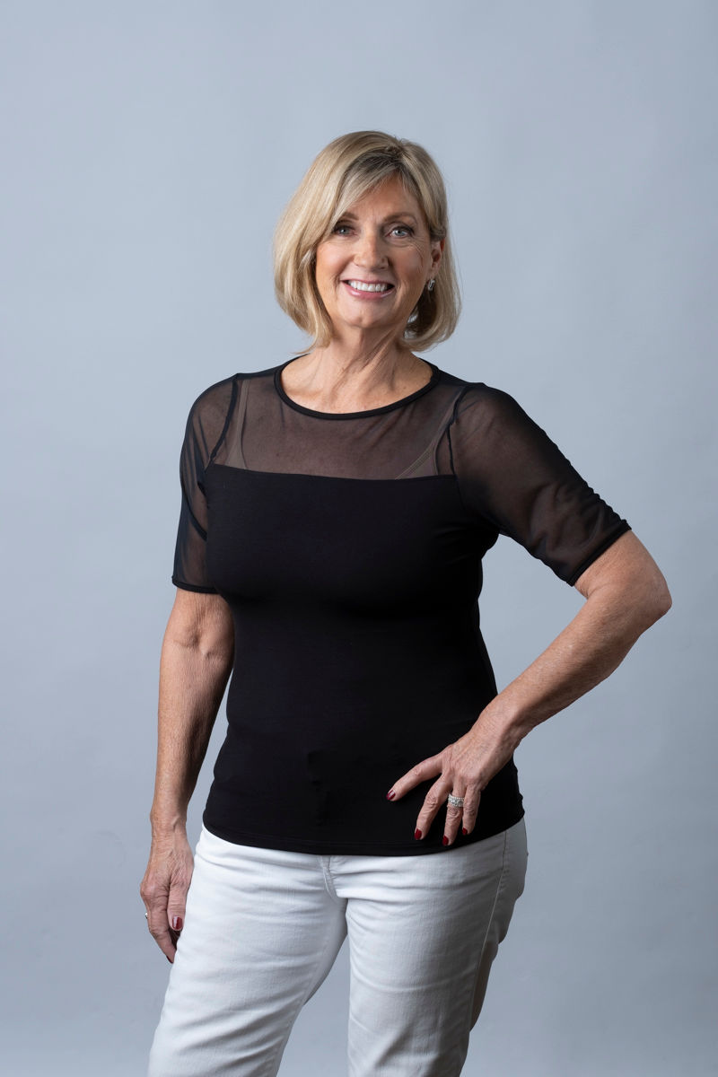 Close-up view of breathable athletic leggings with mesh panels