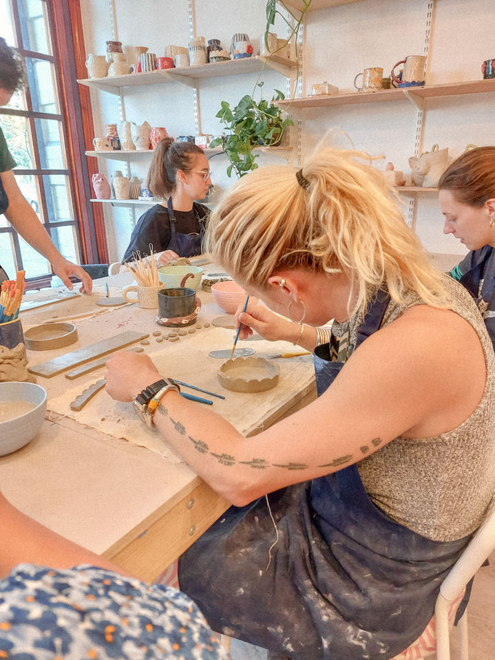Pottery workshop in Bristol full of students.
