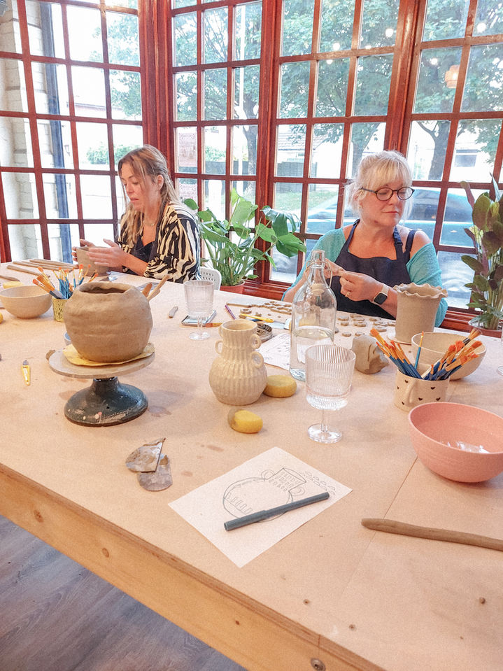 Pottery workshop in Bristol full of students.