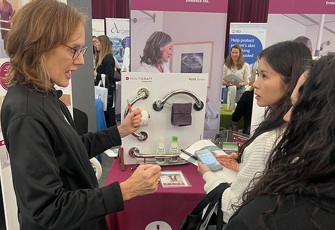 Healthcraft booth - explaining products