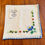 Thumbnail: Whipstitch Floral Cocktail Napkins/Mini Placemats