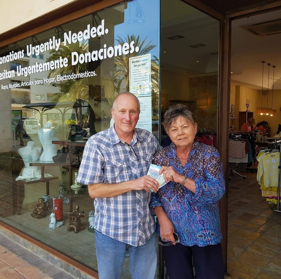 Gary Burr Giving Donation to a Charity