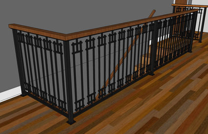 Black metal railing with wooden handrail on stairs.