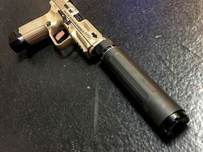 Canik TP9 with a Suppressor on it
