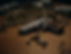 close-up-gun-surrounded-by-bullets_edited.jpg