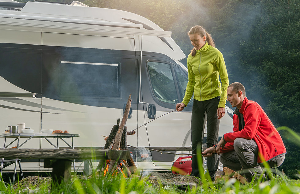 caucasian-couple-rv-park-campfire-fun-PD
