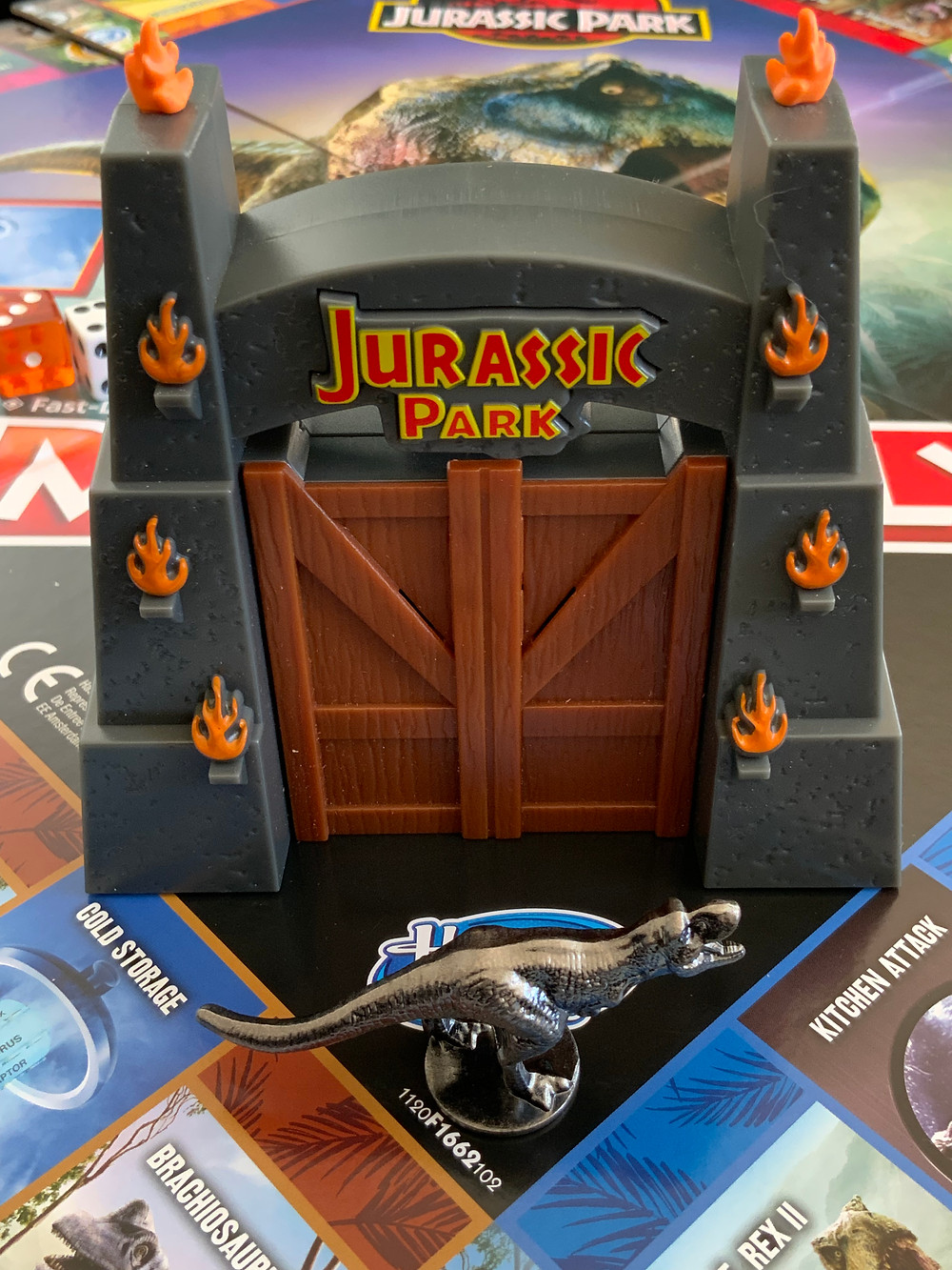The park gates with the Rexy miniatures in the foreground