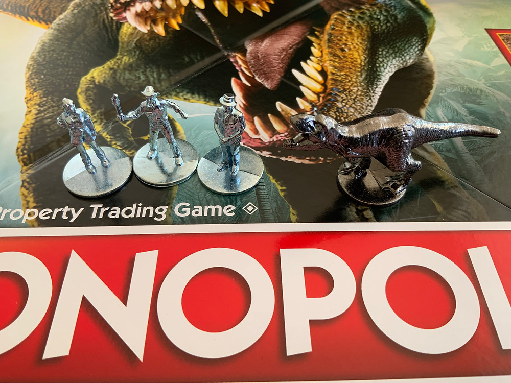 A closeup of the miniatures on top of the game box