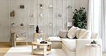 Bright neutral living room, white sofa, tall shelving, plant: Organic modern living room styled with neutral IKEA furniture a