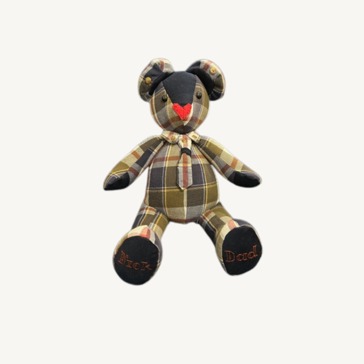Brown plaid memory bear made from cherished clothing.