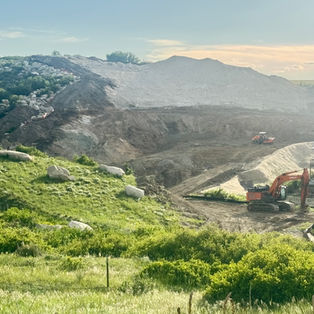 A landslide on a hill directly across from proposed Hillcamp Drive site
