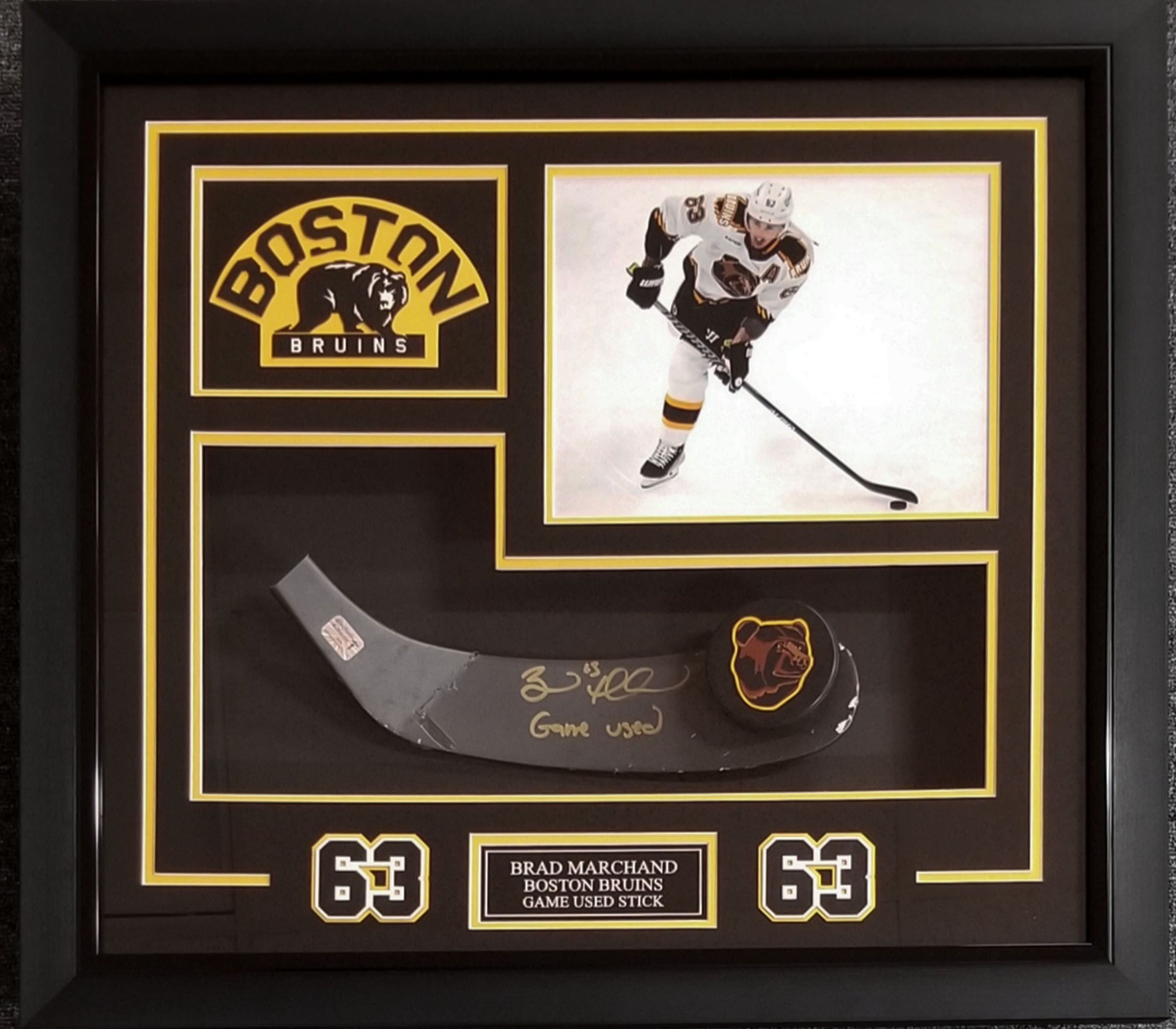 Boston Bruins Brad Marchand Signed Game Used Stick Blade Framed