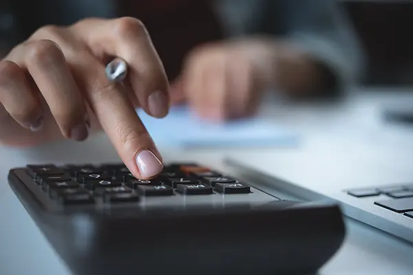 Someone using a calculator.webp