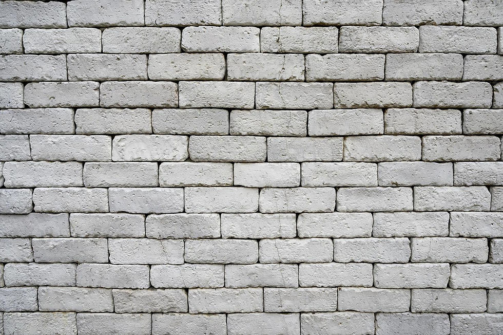 weathered-grey-brick-wall-for-texture-and-background-photo.jpeg