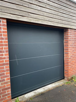 Porte-Garage-sectionnelle-motorisé-Wattrelos