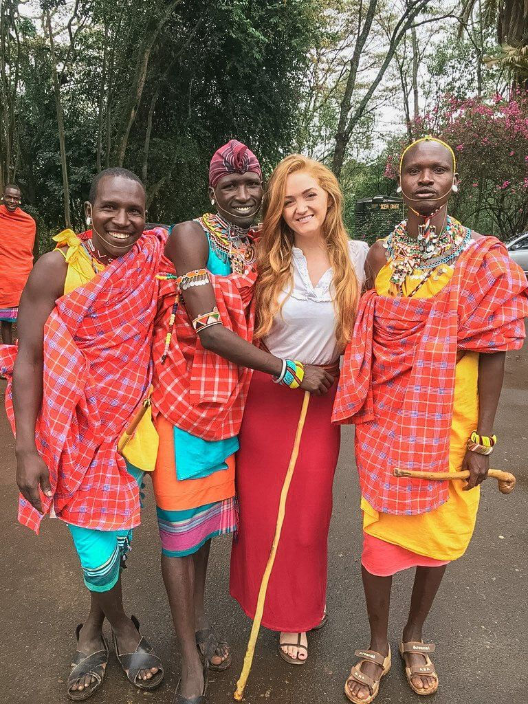 Tourist with Maasai Men