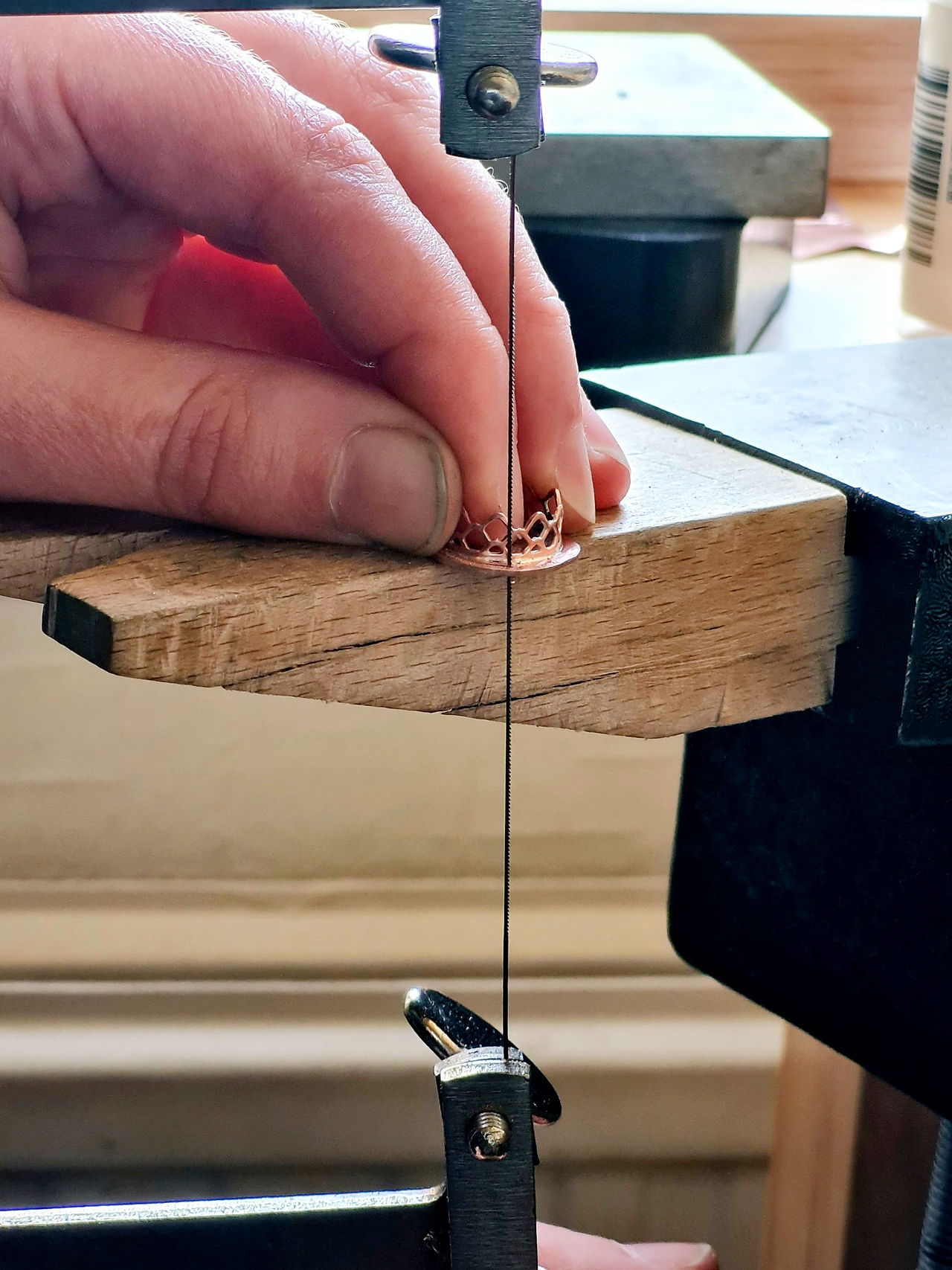 Using a jeweller’s saw to trim backplate.