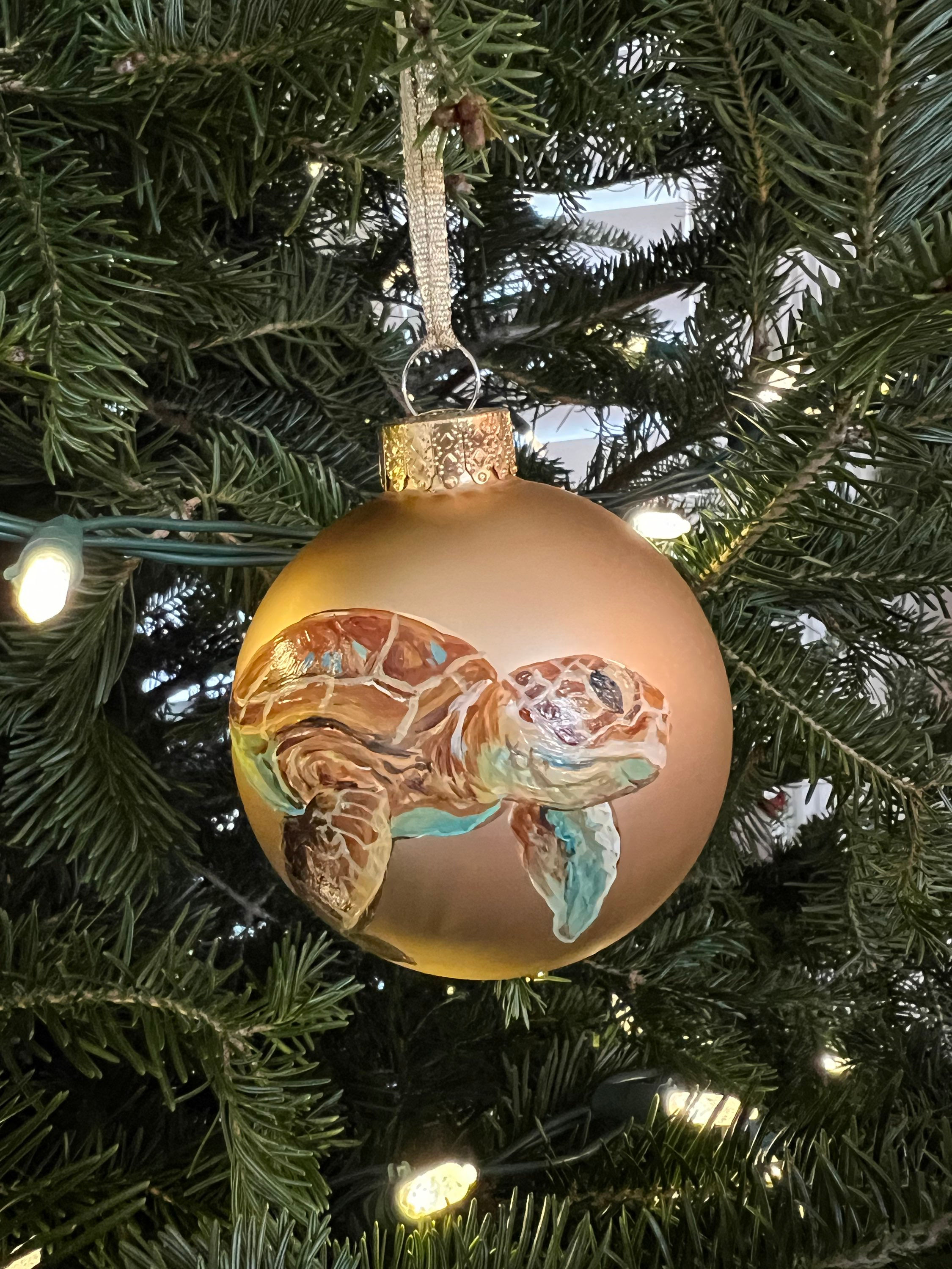 Sea turtle on gold glass ornament 