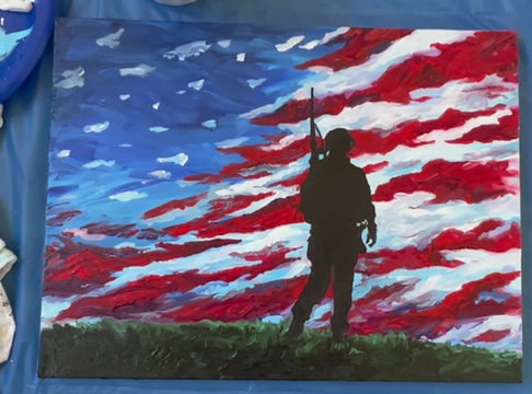 Thumbnail: Military veteran with American flag sky painting