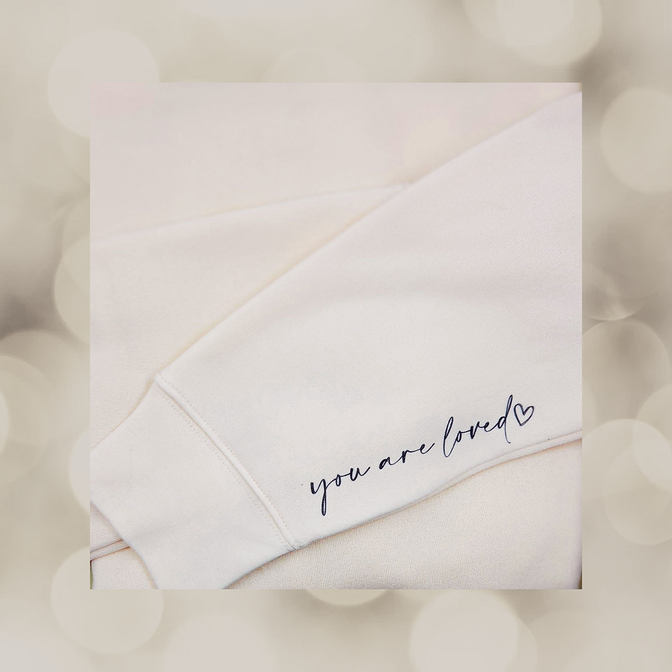 Thumbnail: Folded Songbirds N Soulmates crewneck sweatshirt with sleeve message and front logo shown