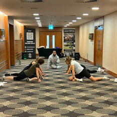 a group personal training session in hotel for the staff for there wellbeing