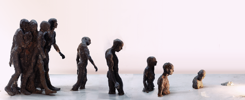 a group of statues are lined up in a row