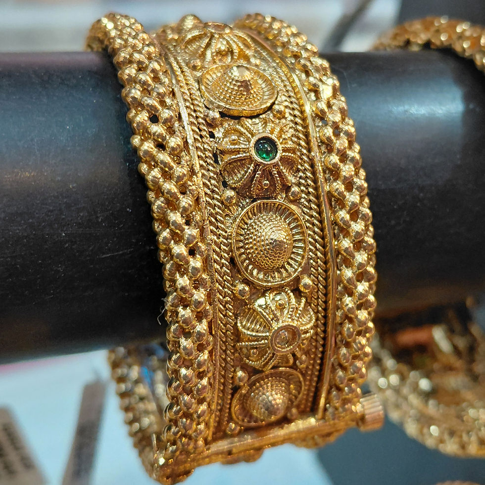 Traditional gold plated kada bangle with intricate filigree