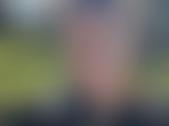 Haven sitting outside in soft sunlight, symbolizing awakening and peaceful homecoming.  