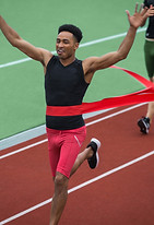 handsome-african-athlete-man-crossing-fi