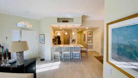 12. Wide view of kitchen and living room on Quail Crown Dr.
