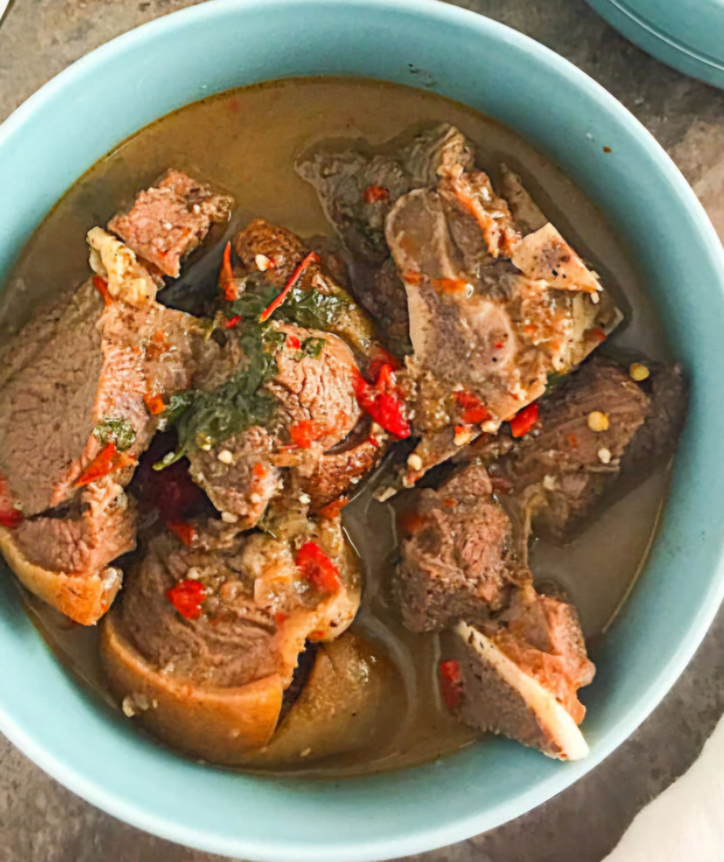 Goat meat pepper soup half pan