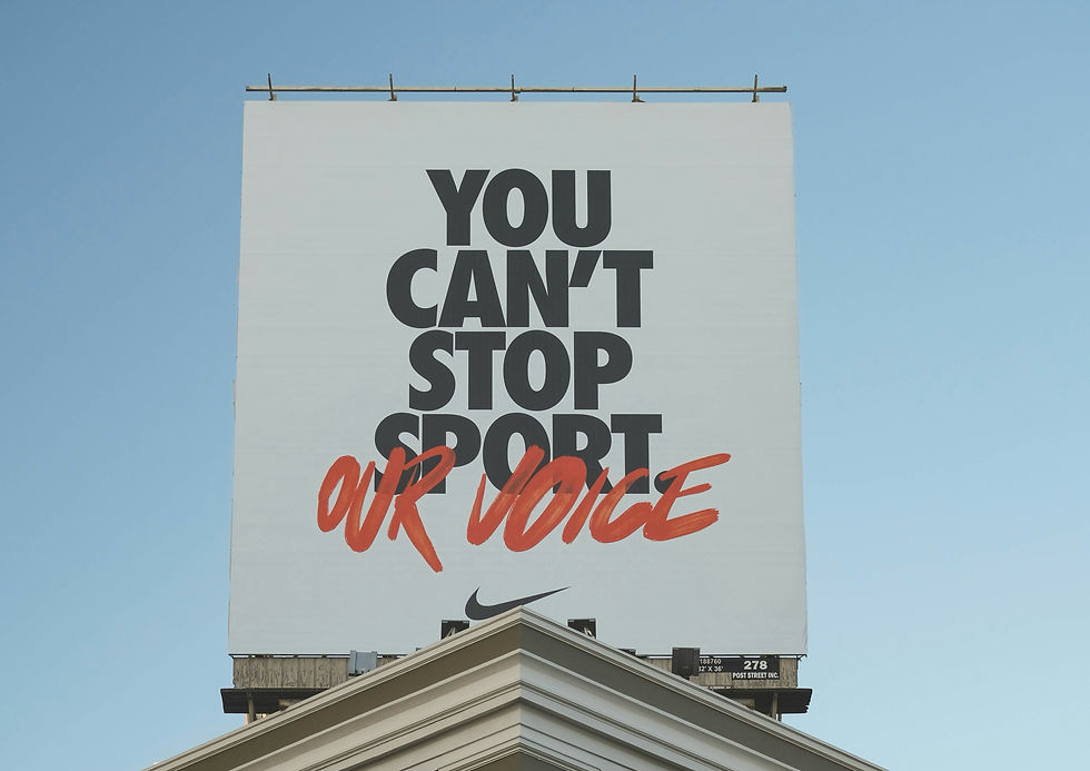 Nike billboard text reads you can't stop sport our voice