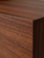 Dark wood grain detail on corner