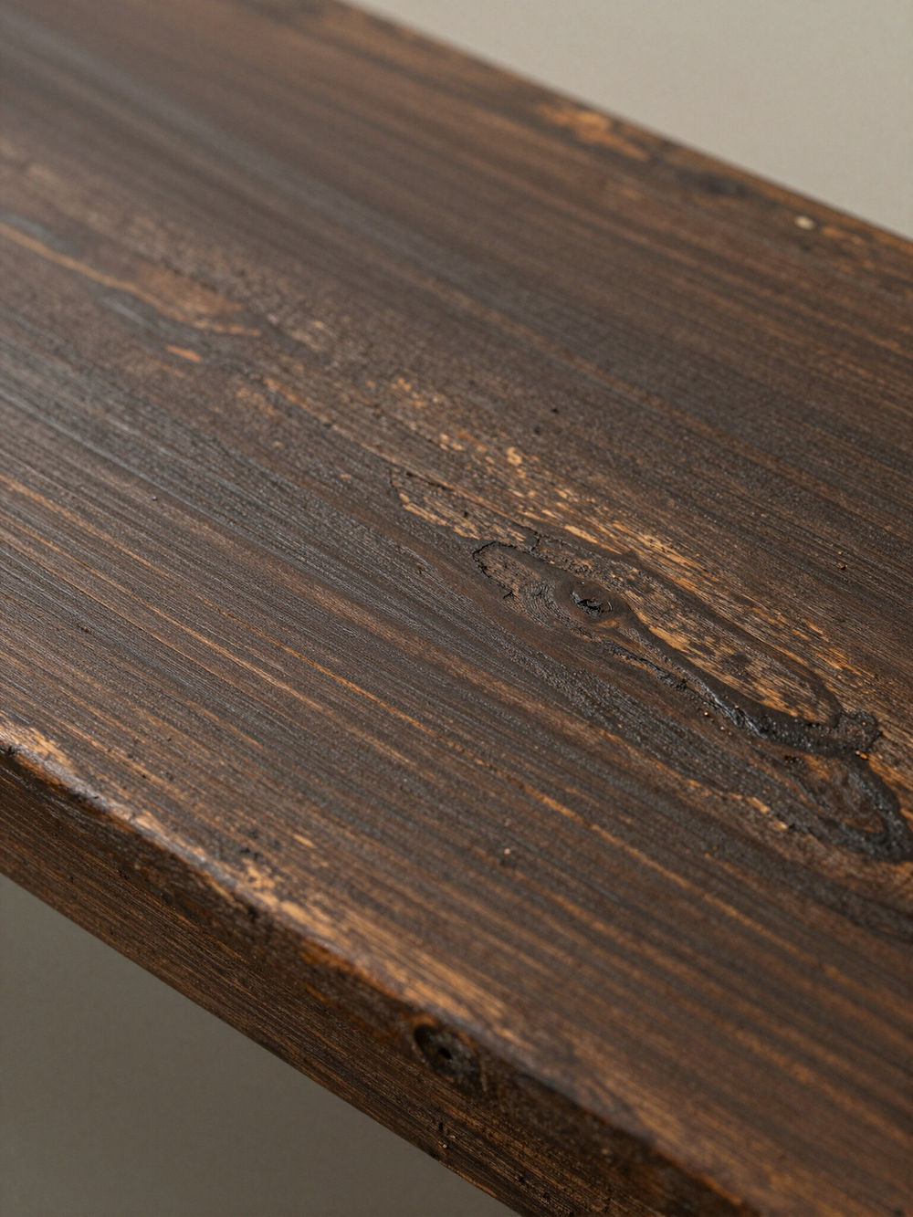 Dark rustic wood with visible natural grain