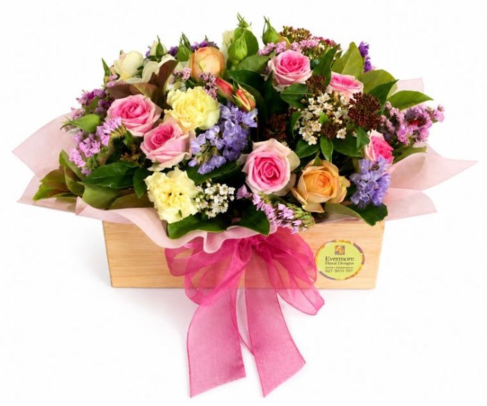 Treasure-assorted pastel roses and foliage in a bamboo wood box with water
