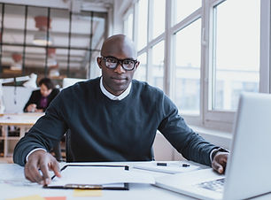 Black man at desk