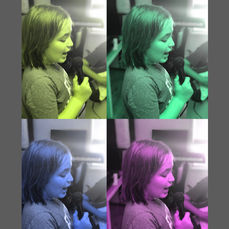 Boy singing into the mic