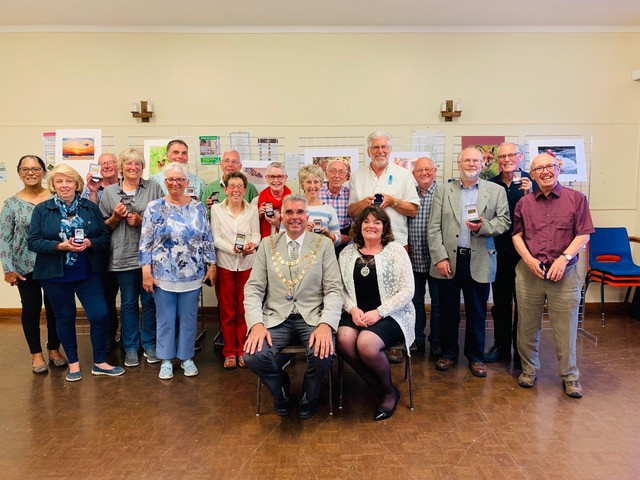 The new Mayor of Teignmouth, Robert Phipps, with the winning members of the Dawlish & Teignmouth Camera Club for their end of season finale, the Awards Evening.