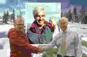 Club Member Bob Clowes shaking hands with Andrew Cooper.