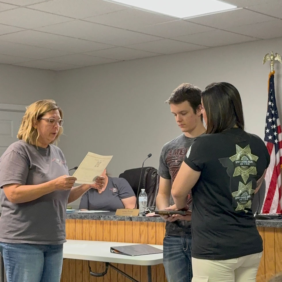 Alderman Purcell being sworn in at Winfield Board of Aldermen meeting after re-election