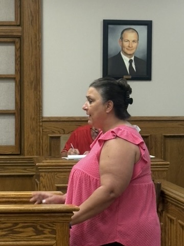 Lincoln County Collector Jessica Zumwalt answers questions about the upcoming delinquent tax sale and Senior Property Tax Credit during the July 9 commission meeting.