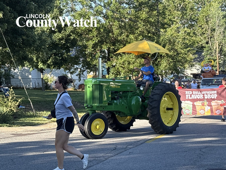 Families, first responders, local businesses, youth organizations, horses, tractors and decorated entries participate in the 2026 Lincoln County Fair Parade in Troy, Missouri.