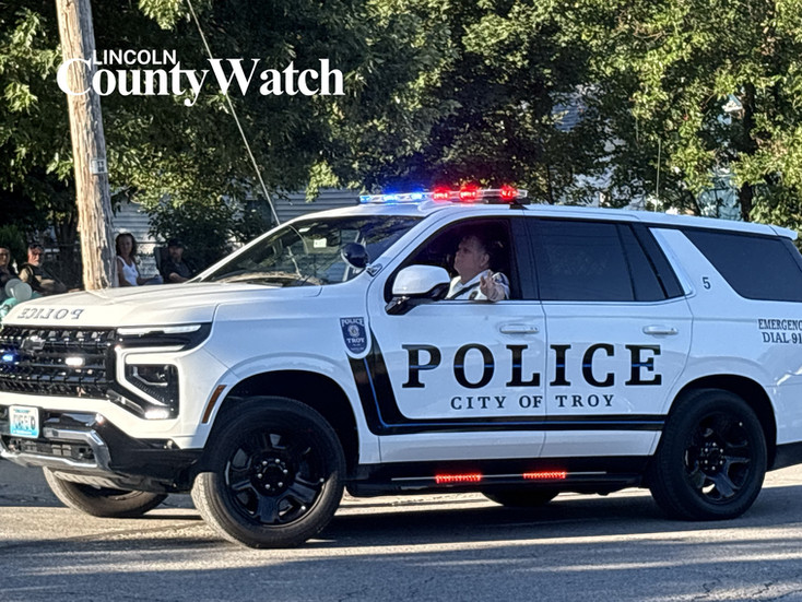 Families, first responders, local businesses, youth organizations, horses, tractors and decorated entries participate in the 2026 Lincoln County Fair Parade in Troy, Missouri.