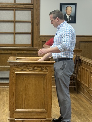 A Cochran Engineering representative provides an update on the regional water project during the July 9 Lincoln County Commission meeting in Troy, Missouri.