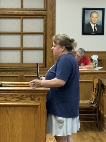 Terry Bell speaks during the July 9 Lincoln County Commission meeting in Troy, Missouri, about a request to use a room in the historic courthouse for a history-related presentation.