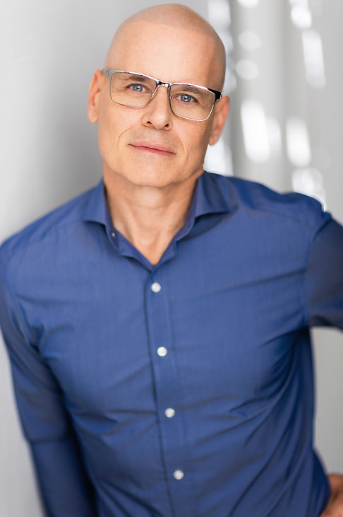 KevinKenaleyHeadshotGlasses.jpg