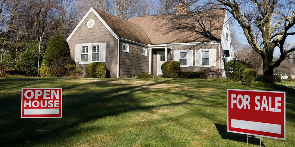 Suburban house with manicured lawn and red Open House and For Sale signs in front on a sunny day